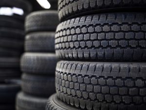Image of a stack of car and truck tires in stock at Ross Tire & Service in Lafayette, LA