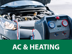 Automobile with hood open and AC diagnostic machine with AC & HEATING